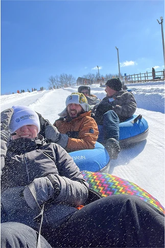 Workers enjoying snow